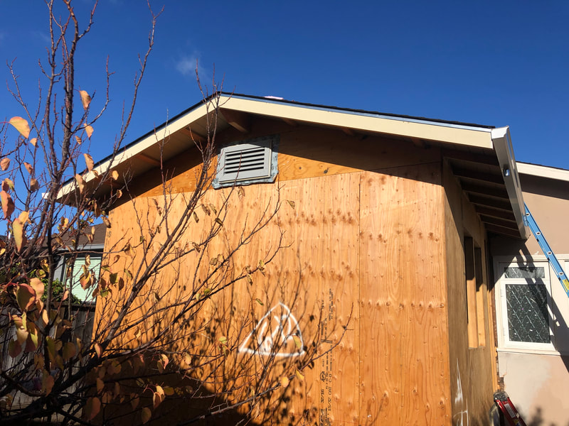 DLM Builders Instagram post — roofline and siding tie-in